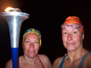 On French sands with the World Harmony Run torch (Viktoria took it on the dinghy and brought it to the shore)