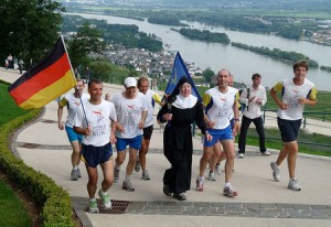 Sister Christophora, running from the monastery of St. Hildegard of Bingen to the Germania